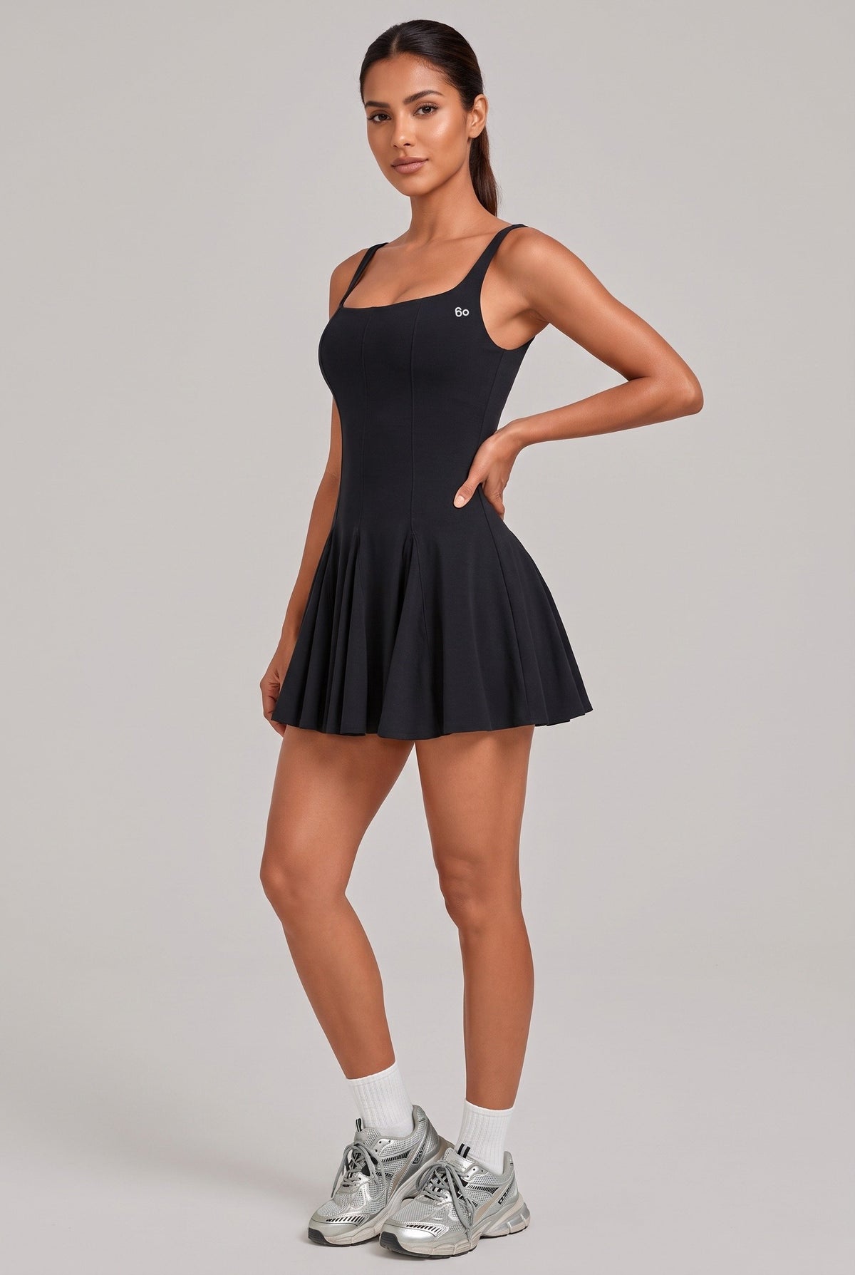 EMMA square neck pleated dress in Black – women's padel dress by Six'o – studio photo