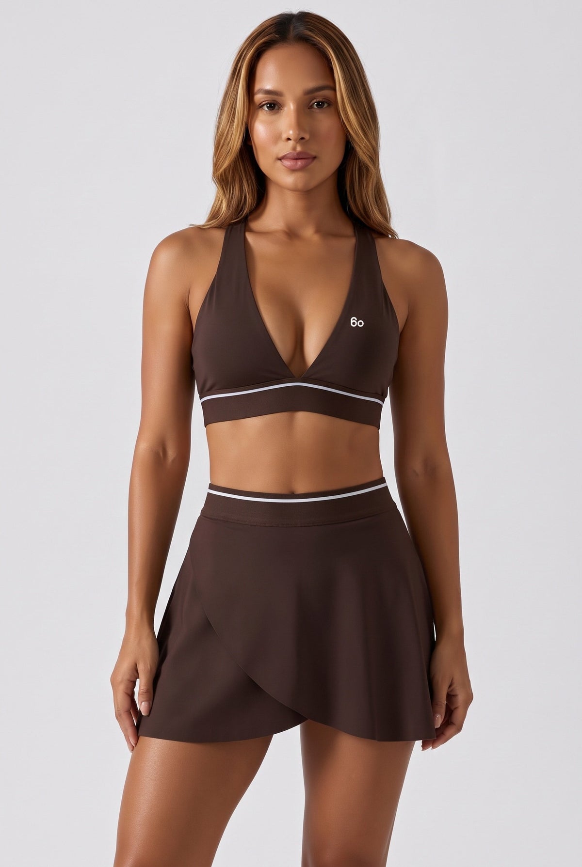 FREYA plunge bra & skirt set in Espresso brown – women's padel set by Six'o – front view