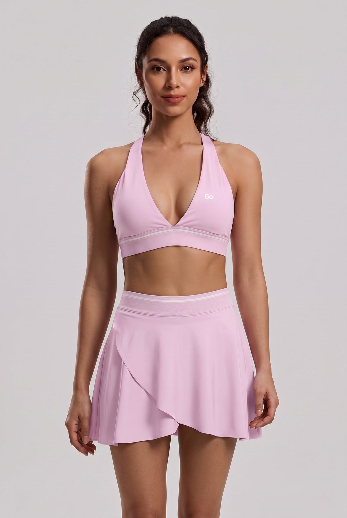 FREYA plunge bra & skirt set in Pink diamond – women's padel set by Six'o – full-length studio photo