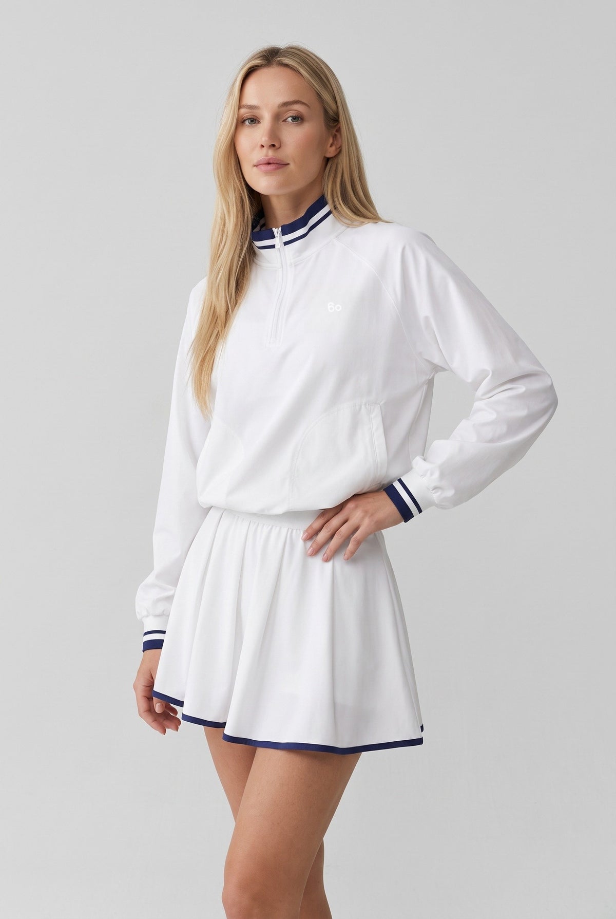 GRACE zip sweater & skirt set in White set – women's padel set by Six'o – studio photo