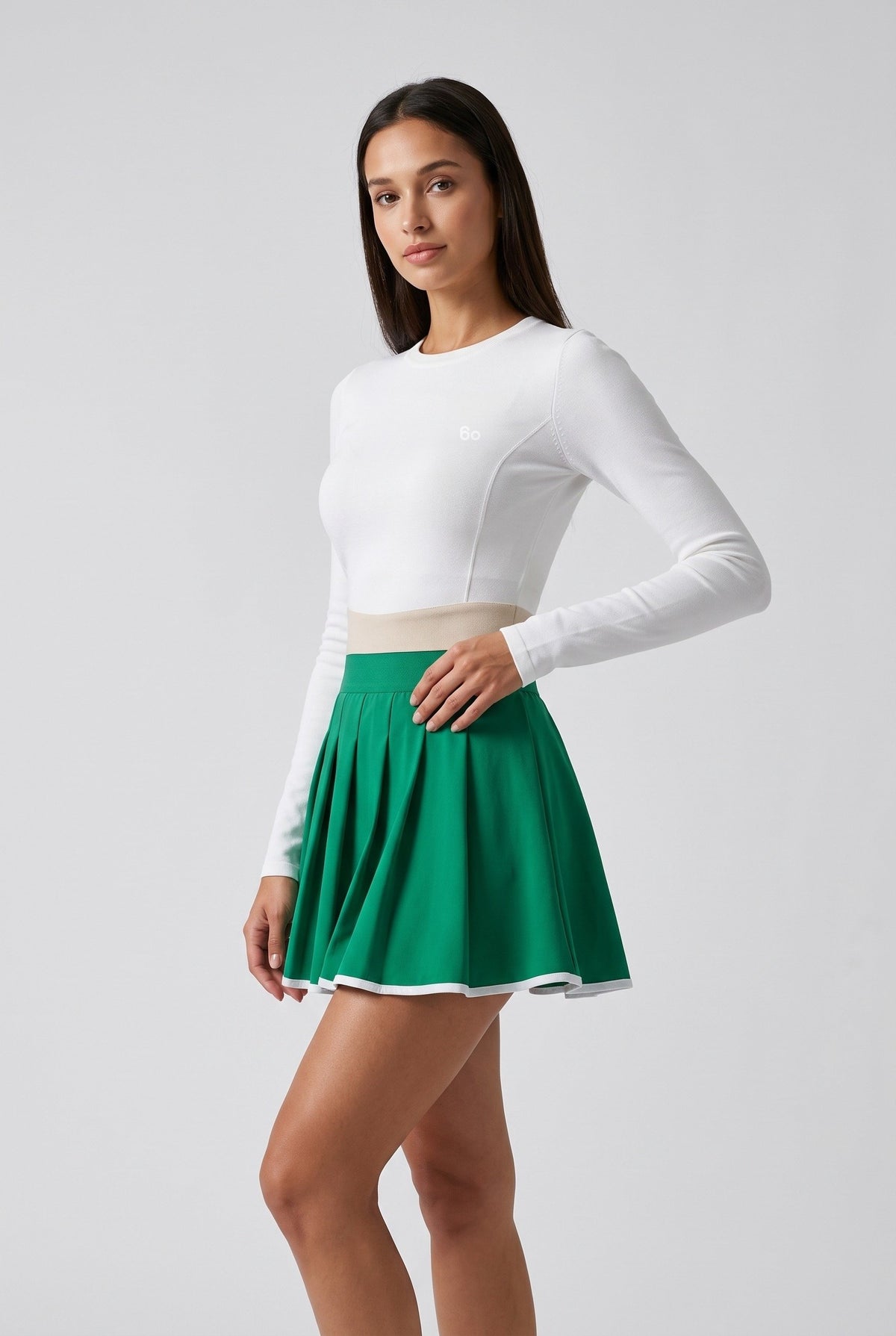GRACE zip sweater & skirt set in White sweater green skirt – women's padel set by Six'o – studio photo