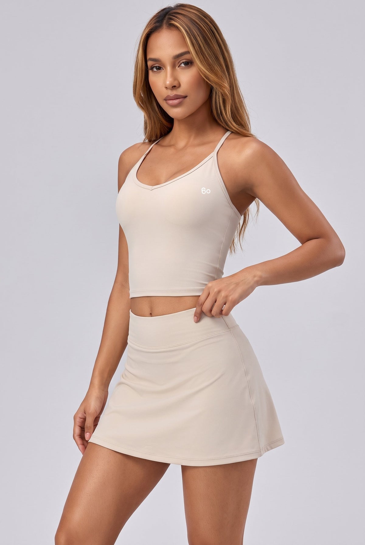 JADE cami top & skirt set in Vanilla white – women's padel set by Six'o – studio photo