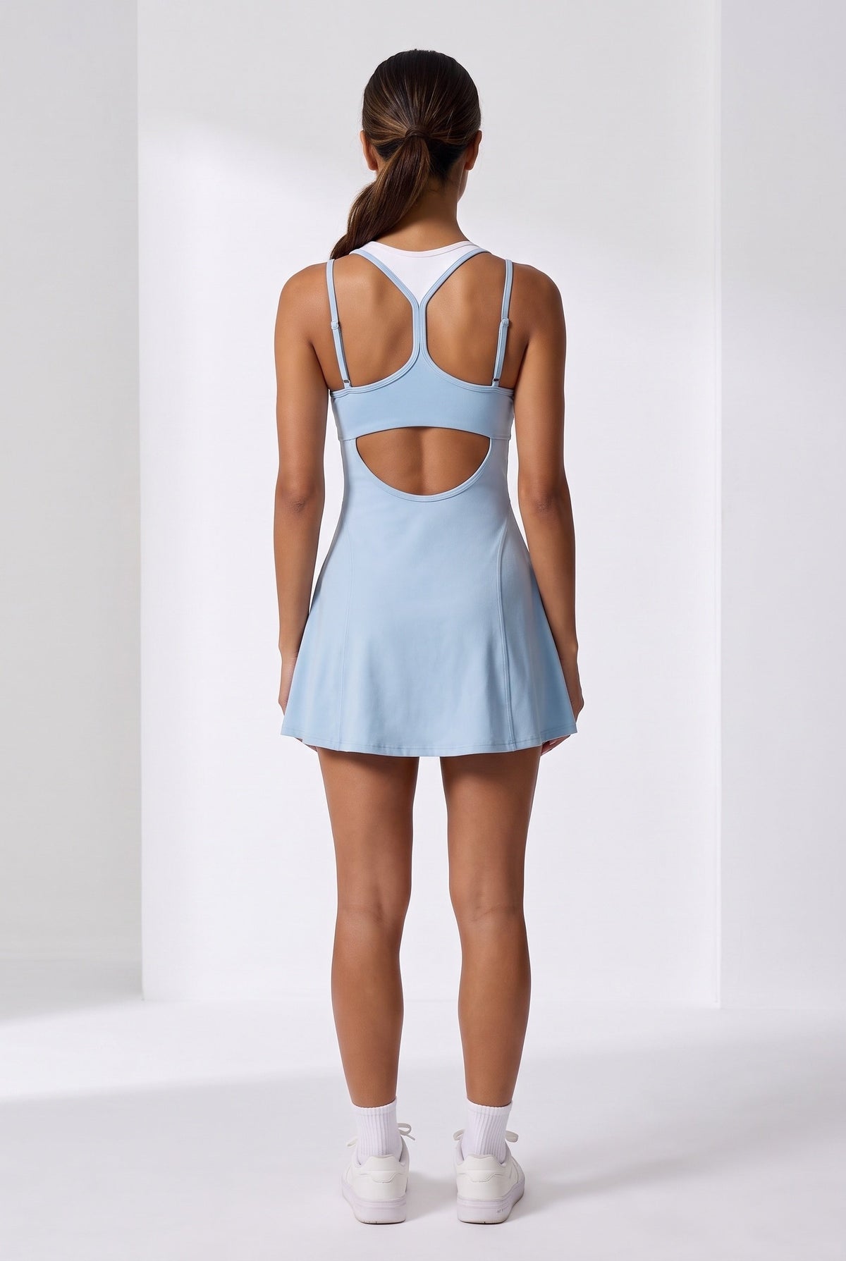 LOLA racerback padel dress in Sun blue – women's padel dress by Six'o – back view