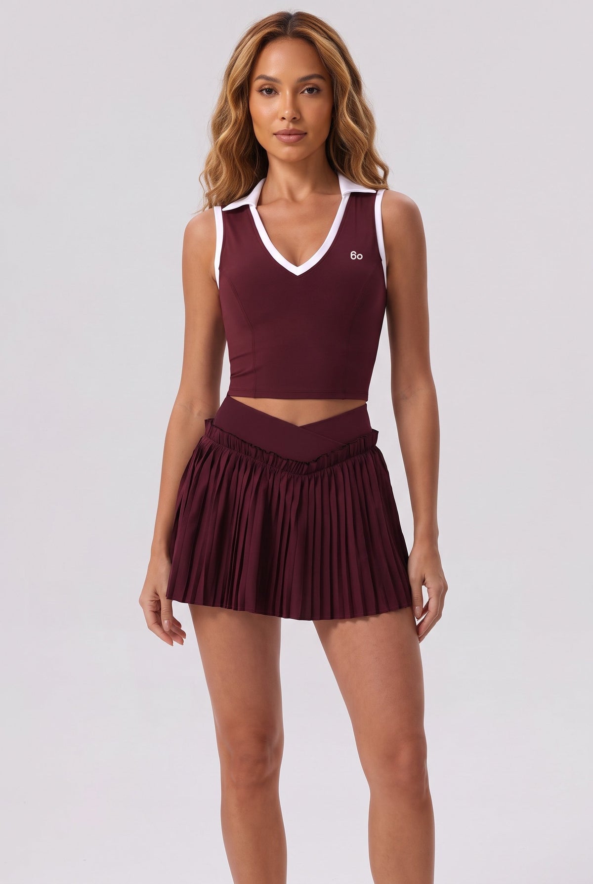 LUNA v-neck top & pleated skirt set in Burgundy – women's padel set by Six'o – front view