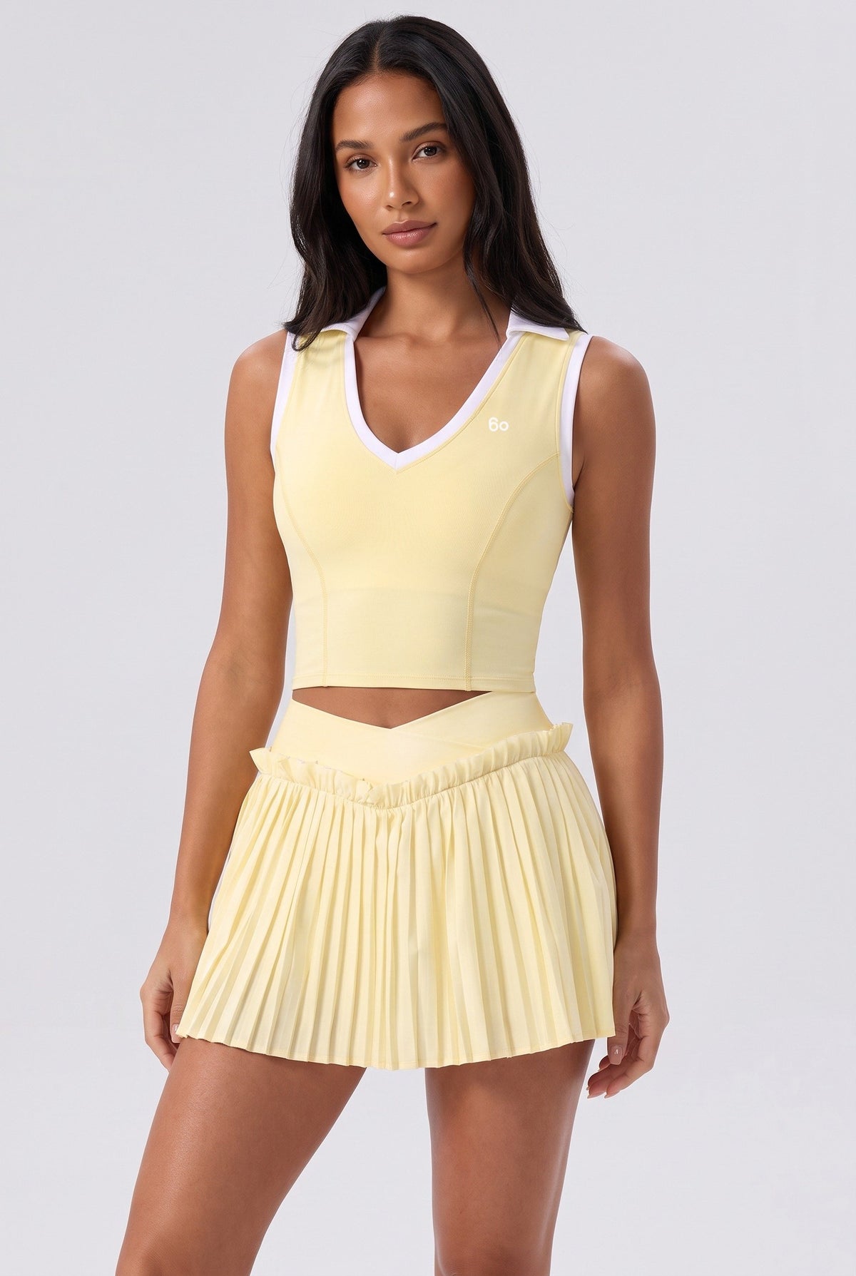 LUNA v-neck top & pleated skirt set in Yellow – women's padel set by Six'o – front view