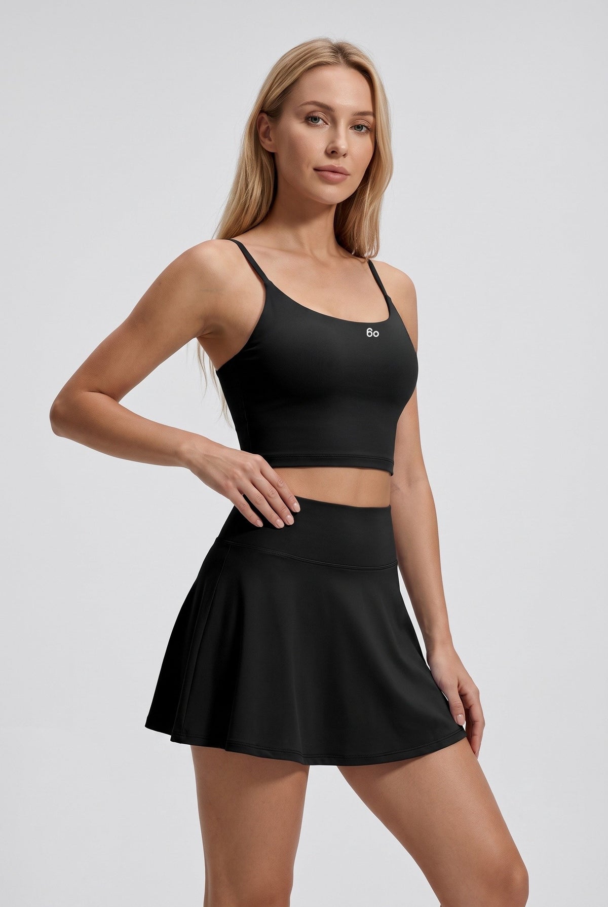 MILA cami bra & flare skirt set in Black – women's padel set by Six'o – studio photo