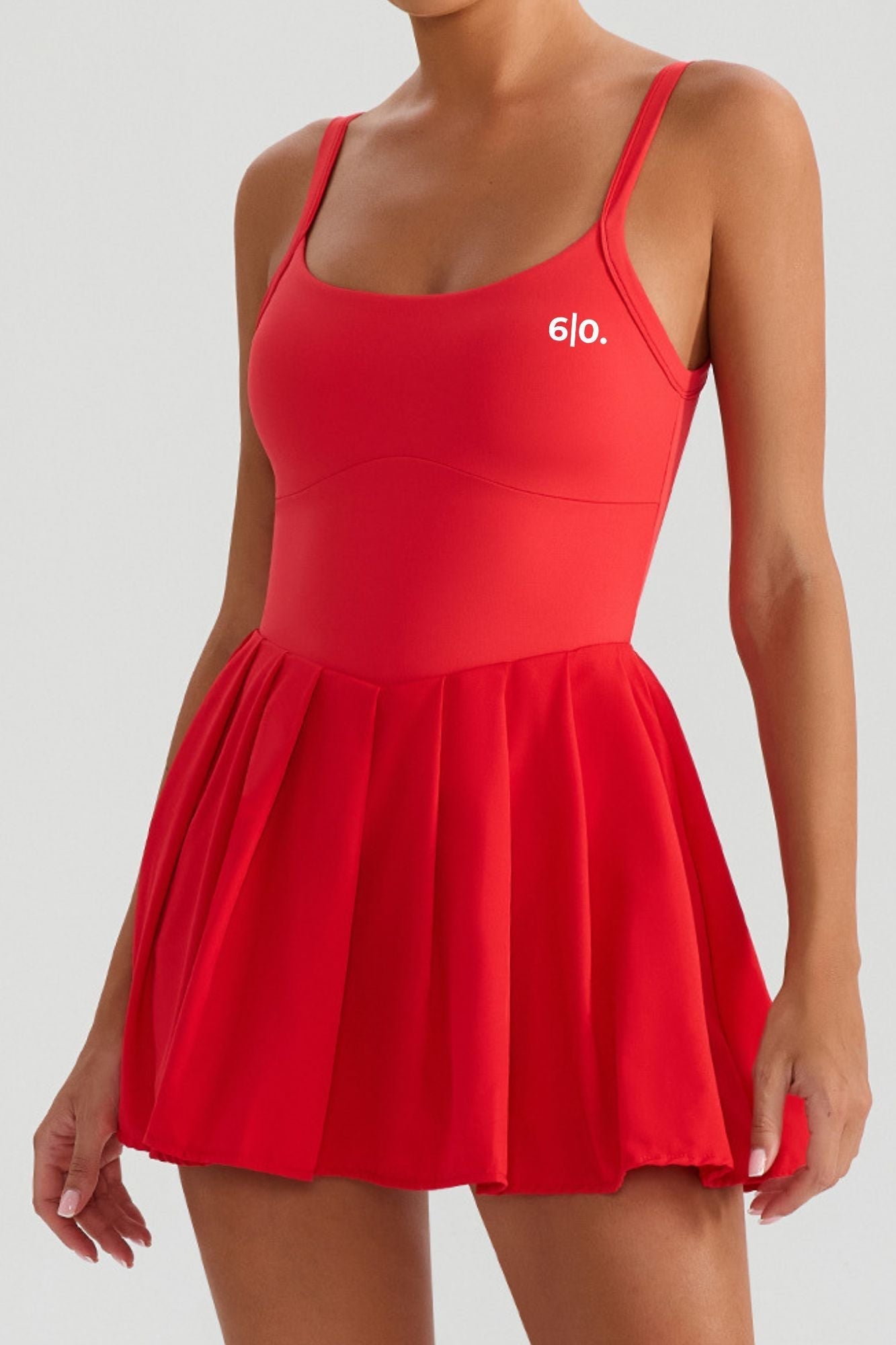 Woman wearing Six'o Apparel ZIVA padel dress