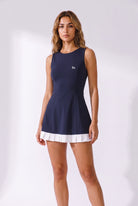 AMBER cross-back padel dress in Navy – women's padel dress by Six'o – front view