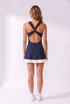 AMBER cross-back padel dress in Navy – women's padel dress by Six'o – back view