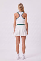 CHLOE varsity v-neck padel dress in Green – women's padel dress by Six'o – back view