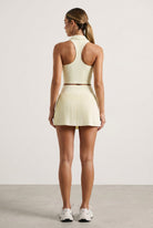 CLEO polo top & pleated skirt set Cream