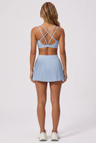 CORA bra top & pleated skirt set in Ice blue – women's padel set by Six'o – back view