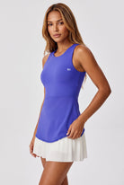DAISY colourblock pleated dress in Cobalt blue – women's padel dress by Six'o – studio photo