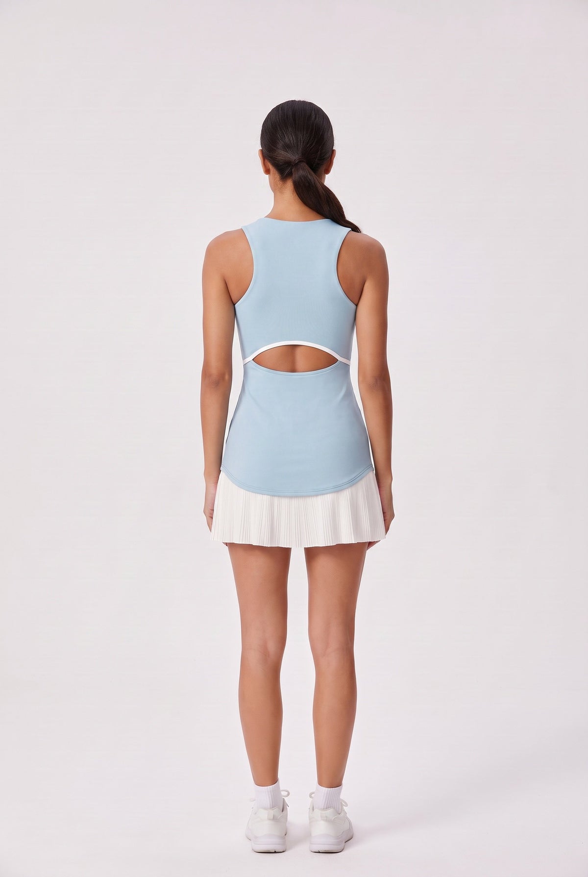 DAISY colourblock pleated dress in Glacier blue – women's padel dress by Six'o – back view