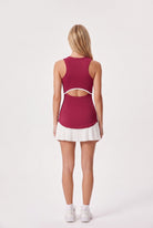 DAISY colourblock pleated dress in Persian red – women's padel dress by Six'o – back view