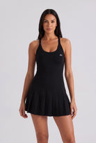 ELLA scoop neck pleated padel dress in Black – women's padel dress by Six'o – front view