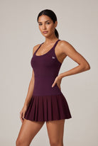 ELLA scoop neck pleated padel dress in Purple – women's padel dress by Six'o – studio photo