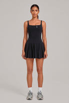 EMMA square neck pleated dress in Black – women's padel dress by Six'o – front view