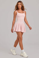 EMMA square neck pleated dress in Pink – women's padel dress by Six'o – full-length studio photo