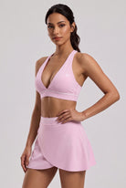 FREYA plunge bra & skirt set in Pink diamond – women's padel set by Six'o – studio photo