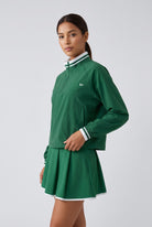 GRACE zip sweater & skirt set in Green set – women's padel set by Six'o – studio photo