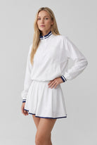 GRACE zip sweater & skirt set in White set – women's padel set by Six'o – studio photo