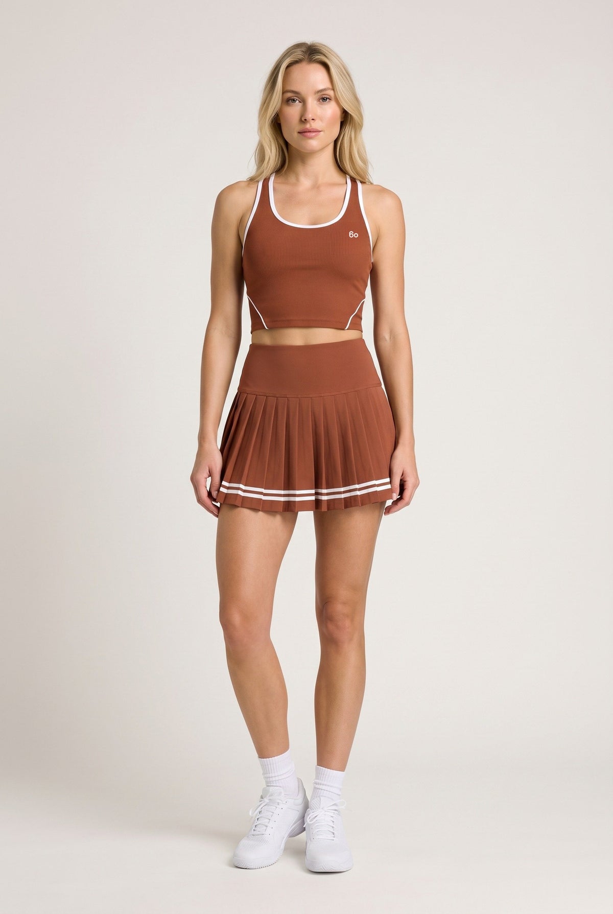 IVY tipped tank & pleated skirt set in Rust – women's padel set by Six'o – front view