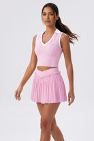 LUNA v-neck top & pleated skirt set in Pink – women's padel set by Six'o – full-length studio photo