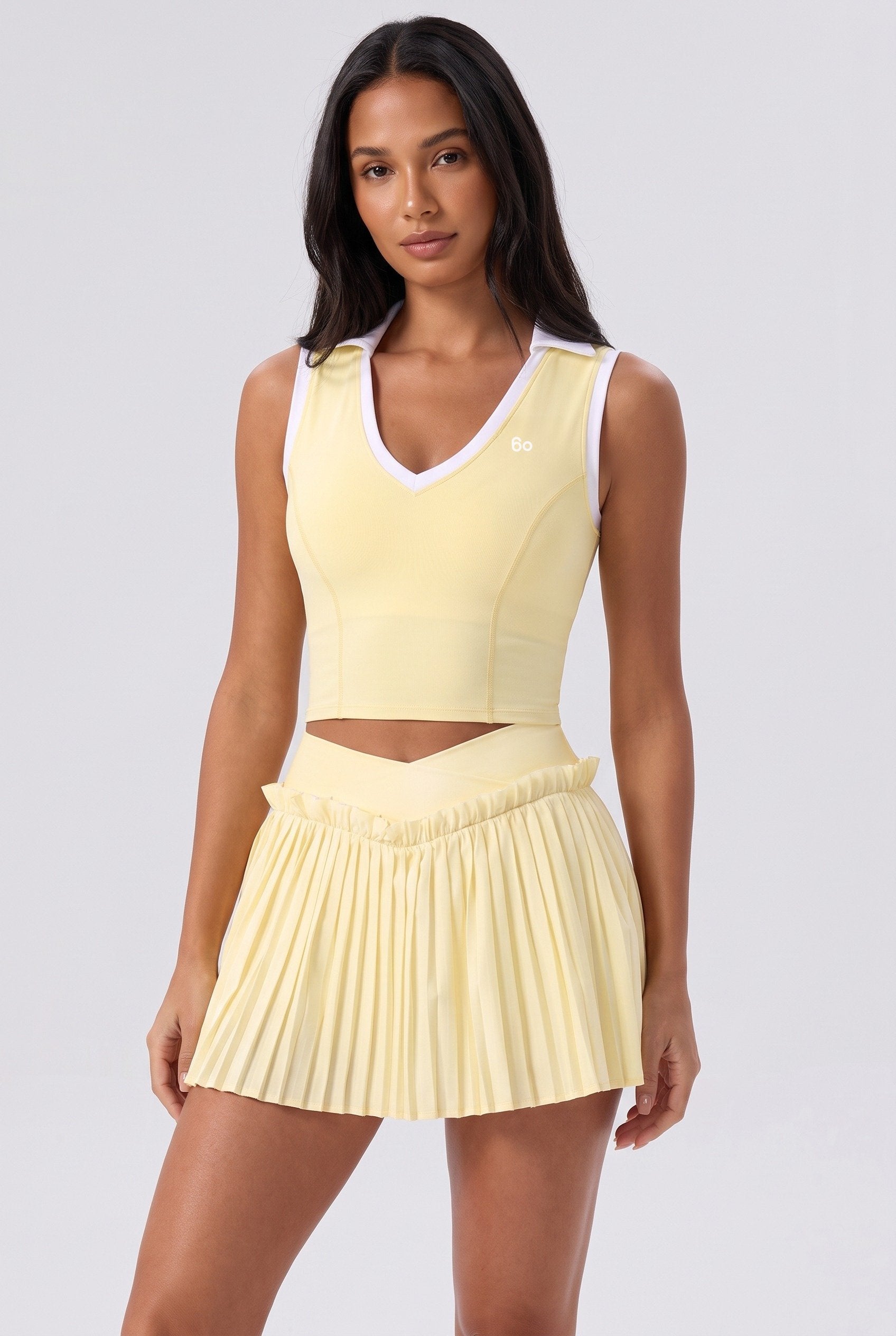 LUNA v-neck top & pleated skirt set in Yellow – women's padel set by Six'o – front view