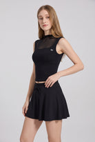 MAYA mesh tank & pleated skirt set in Black – women's padel set by Six'o – studio photo