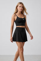 MILA cami bra & flare skirt set in Black – women's padel set by Six'o – full-length studio photo