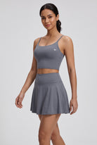 MILA cami bra & flare skirt set in Grey – women's padel set by Six'o – full-length studio photo