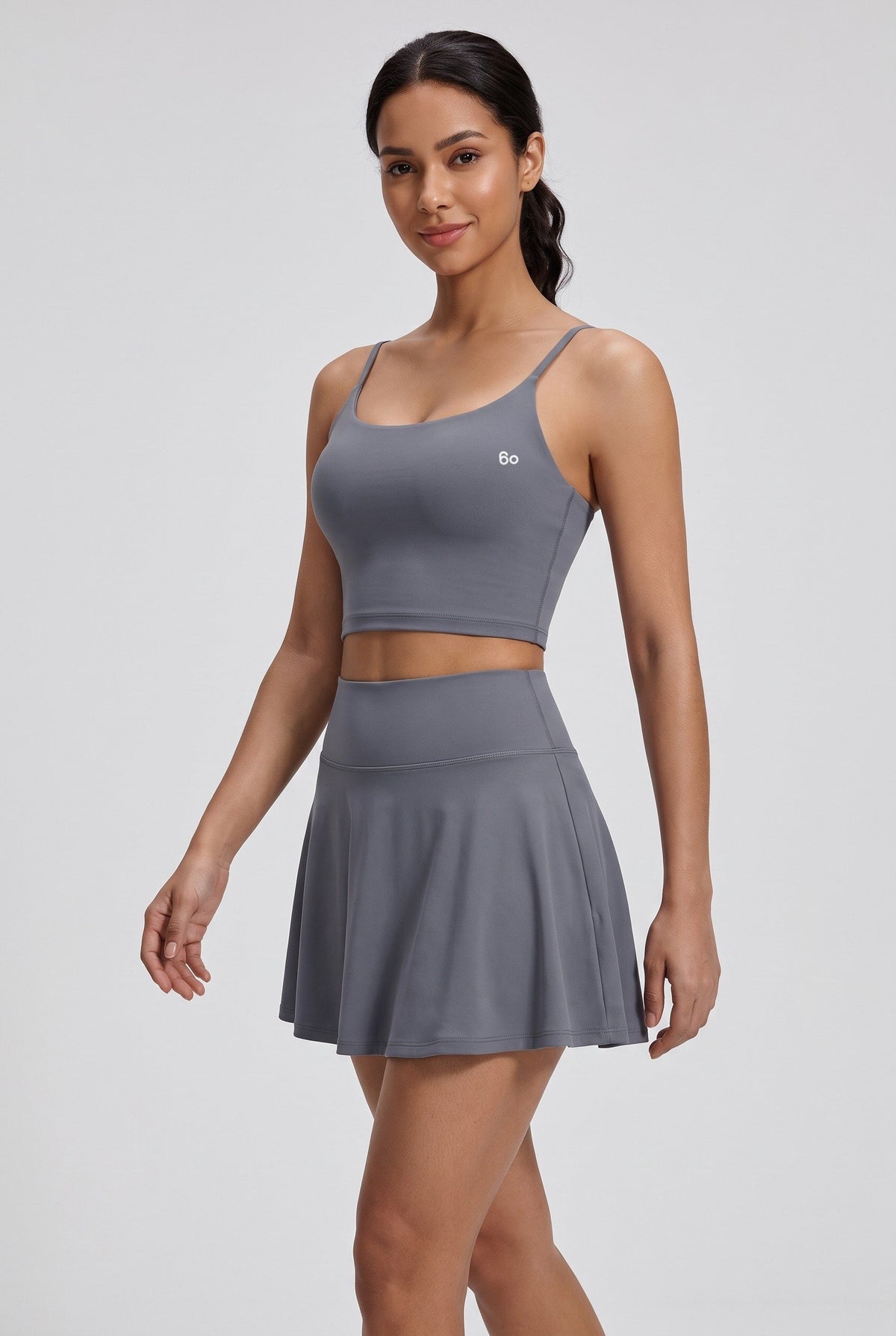 MILA cami bra & flare skirt set in Grey – women's padel set by Six'o – full-length studio photo