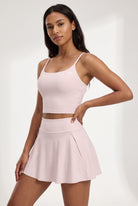 MILA cami bra & flare skirt set in Pink – women's padel set by Six'o – studio photo