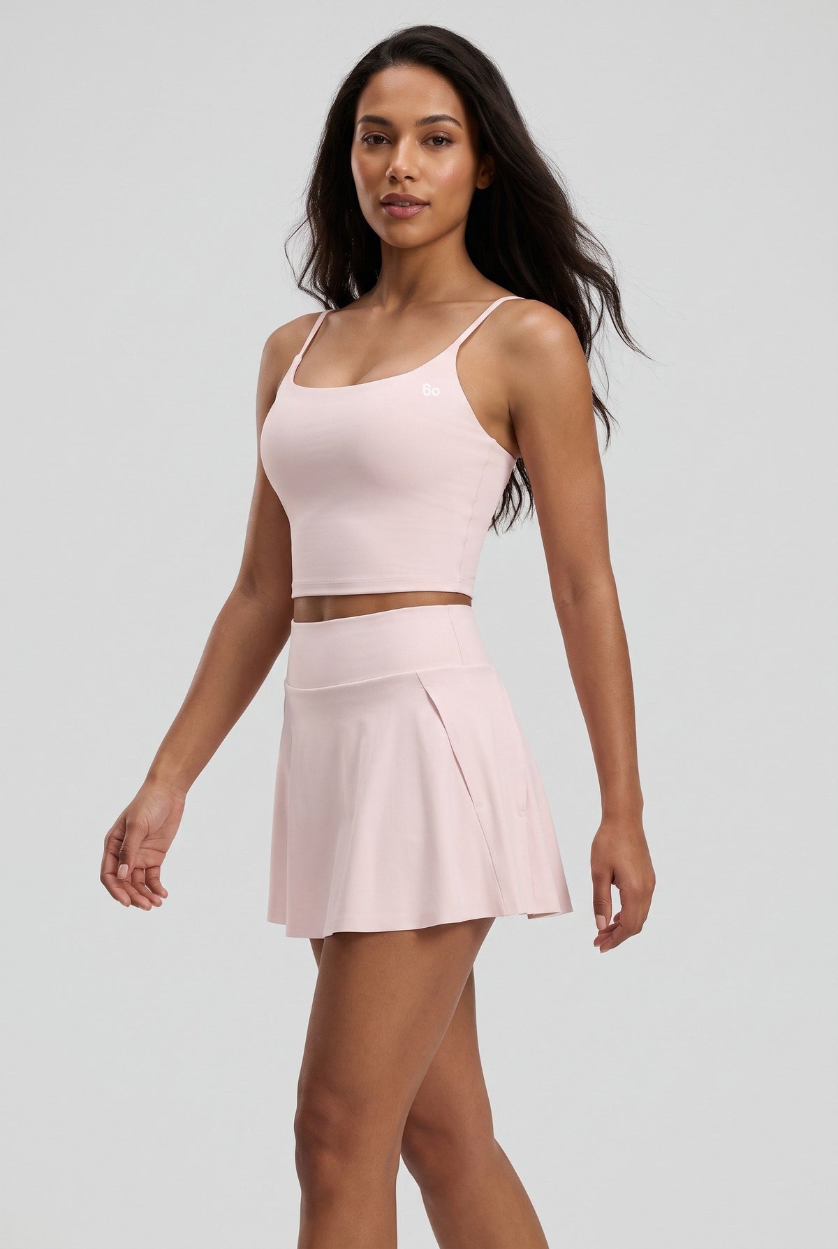 MILA cami bra & flare skirt set in Pink – women's padel set by Six'o – full-length studio photo