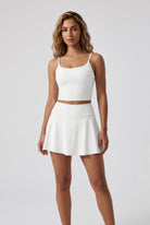 MILA cami bra & flare skirt set in White – women's padel set by Six'o – front view