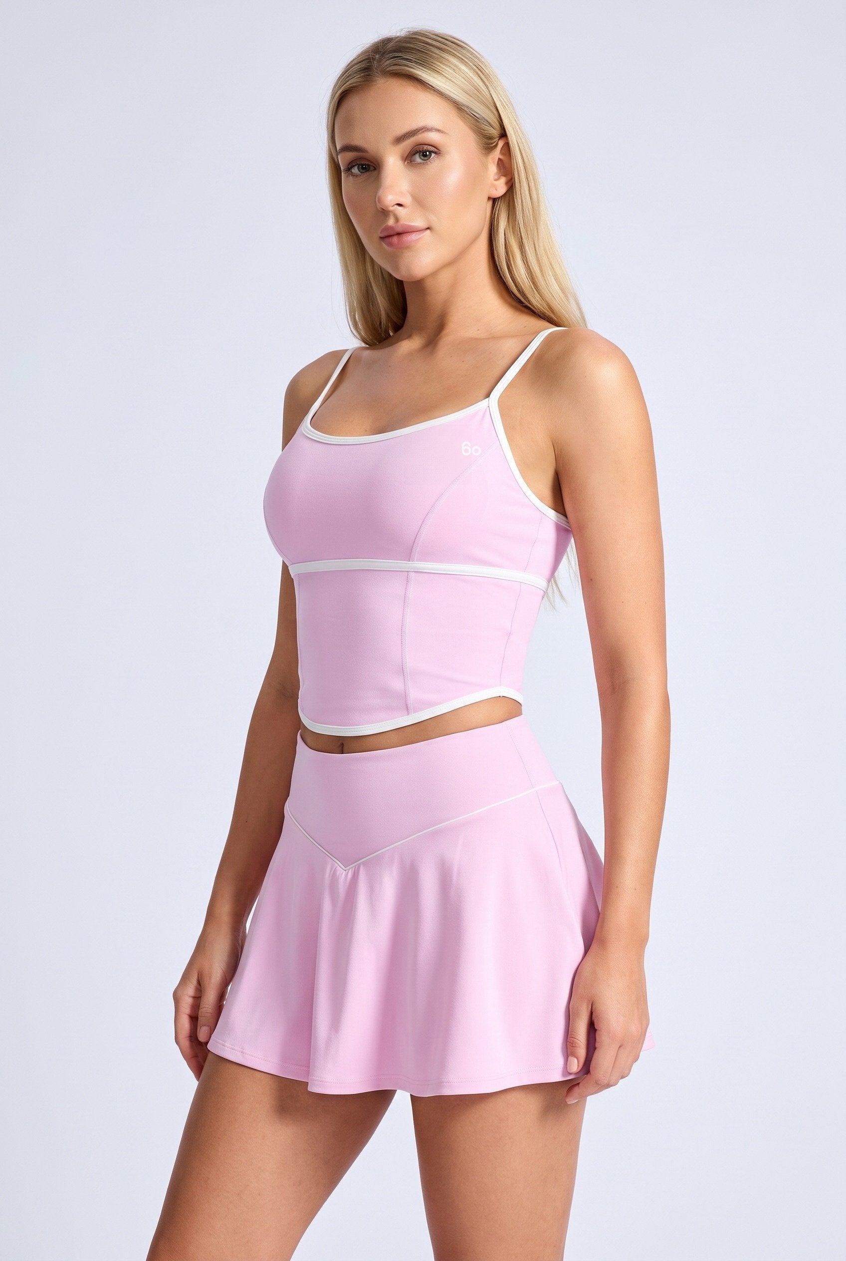 NINA cami top & flare skirt set in Candy pink – women's padel set by Six'o – studio photo