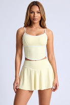 NINA cami top & flare skirt set in Pear yellow – women's padel set by Six'o – front view
