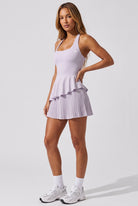 NOVA layered ruffle padel dress in Lavender – women's padel dress by Six'o – studio photo