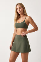 OLIVIA strap bra & skirt set in Moss green – women's padel set by Six'o – studio photo