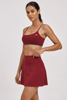 OLIVIA strap bra & skirt set in Red bean – women's padel set by Six'o – studio photo