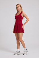 RUBY piped tank pleated dress in Red – women's padel dress by Six'o – studio photo