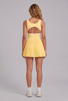 RUBY piped tank pleated dress in Yellow – women's padel dress by Six'o – back view