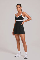 SOFIA contrast trim v-neck dress in Black – women's padel dress by Six'o – studio photo
