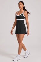 SOFIA contrast trim v-neck dress in Black – women's padel dress by Six'o – full-length studio photo