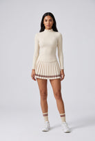 STELLA long sleeve & pleated skirt set in Beige – women's padel set by Six'o – front view