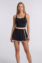 TARA tank top & trim skirt set in Black – women's padel set by Six'o – front view