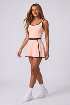TARA tank top & trim skirt set in Peach – women's padel set by Six'o – full-length studio photo