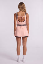 TARA tank top & trim skirt set in Peach – women's padel set by Six'o – back view