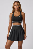 TESSA striped tank & pleated skirt set in Black – women's padel set by Six'o – front view